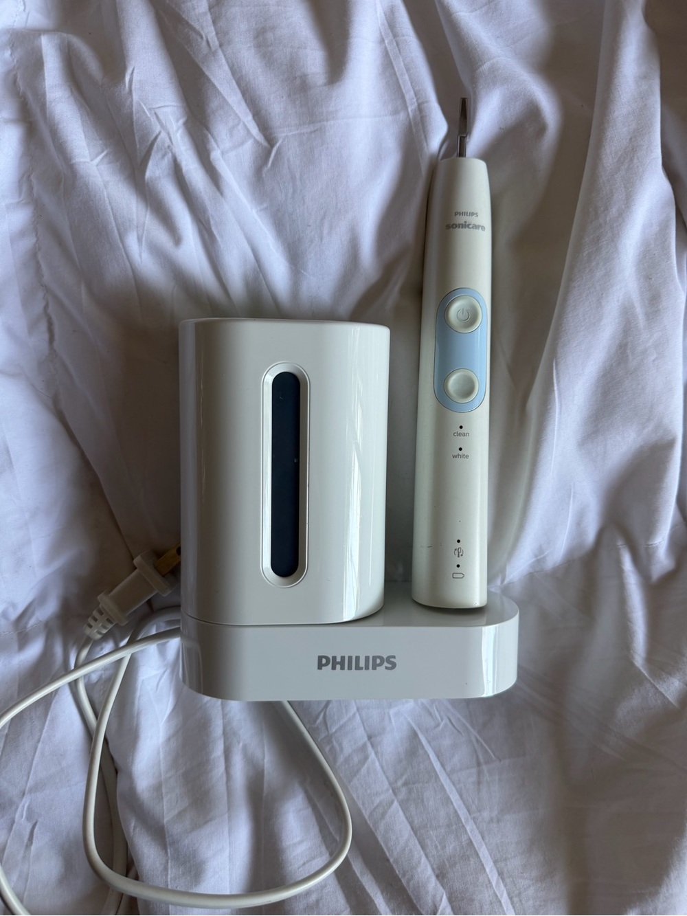 Philips White Electric Toothbrush with Charging Stand